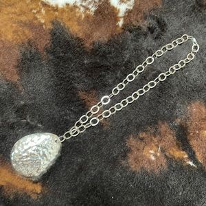 Silpada hammered teardrop pendant necklace.